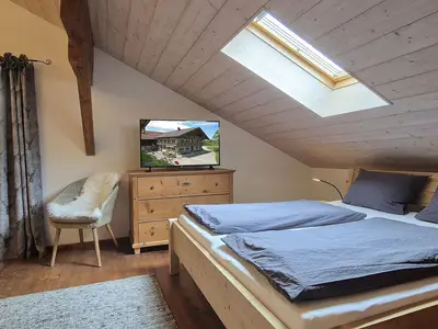 Schlafzimmer mit Sitzecke