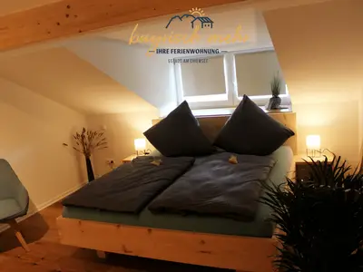 Zirbenschlafzimmer 1 mit Gaubenfenster