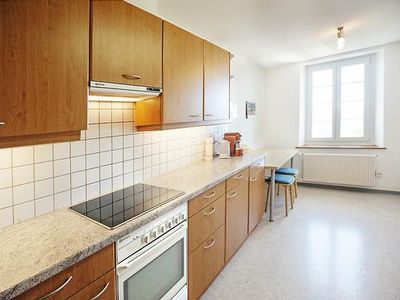 Separate Küche mit Durchgang ins Wohnzimmer