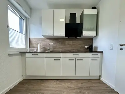 großräumige und sehr modern eingerichtete Küche in der Ferienwohnung Seeliebe II