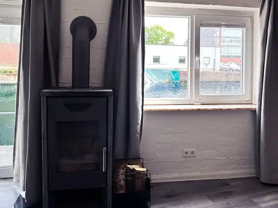 Kamin mit Hafenblick