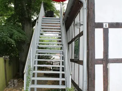 FW Über den Dächern Treppenaufgang zur FeWo