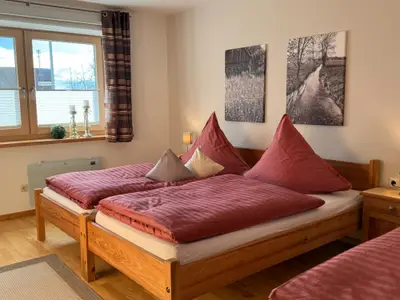 Doppelschlafzimmer mit  Zustellbett Wohnung Apfelblüte