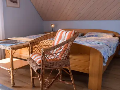 Doppelschlafzimmer mit Zugang zum Balkon