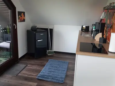 Küche mit Zugang zum Balkon