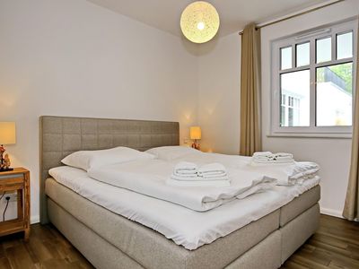 Schlafzimmer mit Doppelbett