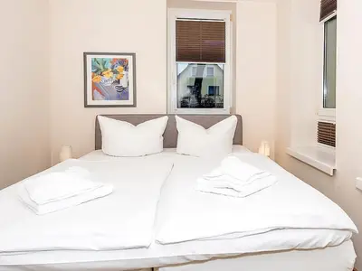 Schlafzimmer mit Doppelbett