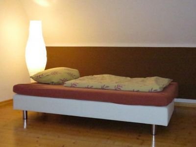 zusätzliche Schlafcouch im Wohnzimmer