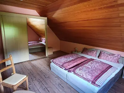 Schlafzimmer mit Doppelbett Schlafzimmer mit Doppelbett