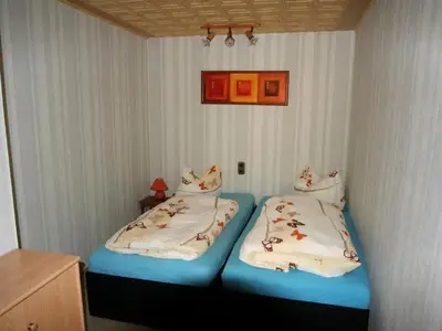 Ferienwohnung "Mönch" Schlafbereich wahlweise mit Doppelbett oder 2 Einzelbetten