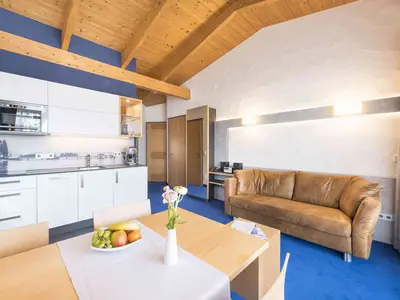 Ferienwohnung - Wohnzimmer mit Küchenzeile
