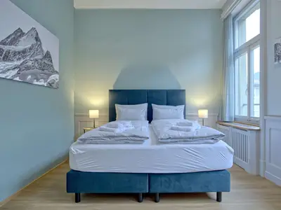 Wohnzimmer / Doppelbett / Essbereich / Küche