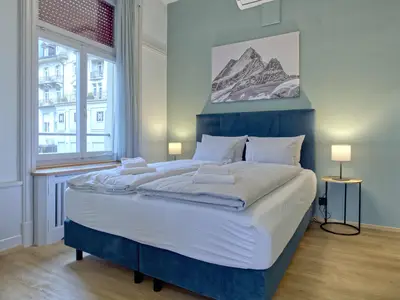 Wohnzimmer / Doppelbett / Essbereich / Küche