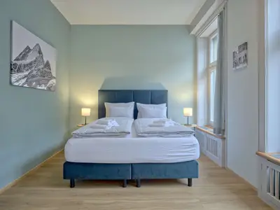 Wohnzimmer / Doppelbett / Essbereich / Küche