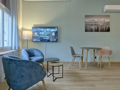 Wohnzimmer / Doppelbett / Essbereich / Küche