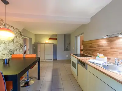 Ferienwohnung Rohrdommel Küchenzeile mit Esstisch