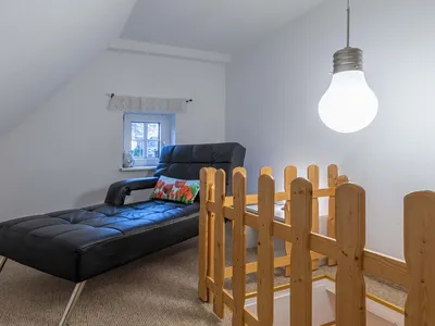 Ferienwohnung Rohrdommel Flur mit Couch