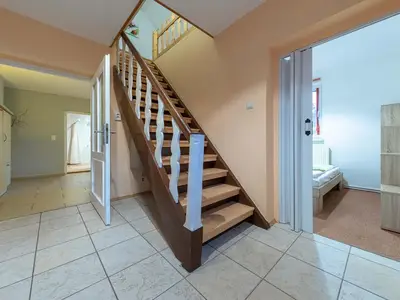 Ferienwohnung Rohrdommel Treppe zum Obergeschoss