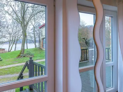 Ferienwohnung Graureiher Blick auf den Loppiner See