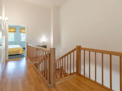 Ferienwohnung Fischadler Treppe vom Obergeschoss ins Erdgeschoss