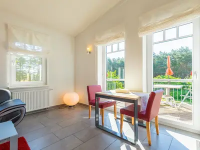 Ferienwohnung Zwergtaucher Essbereich mit Seeblick