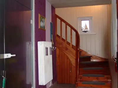 Ihr Eingangsbereich mit Blick auf den Treppenaufgang zu Ihrer Ferienwohnung.