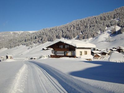 Langlauf-Loipeneinstieg am Haus