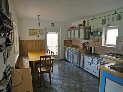 Wohnküche mit Speisekammer und Veranda