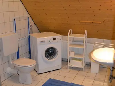 Duschbad mit Waschmaschine