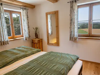 Schlafzimmer mit Doppelbett Berg-und Seeblick Fewo Bergblick