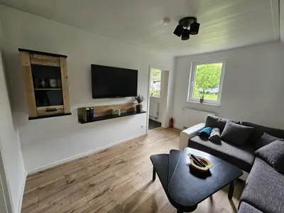 Wohnzimmer mit Fernseher Wohnzimmer mit Fernseher