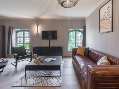 Ferienwohnung Heimathafen Klink Wohnzimmer mit TV
