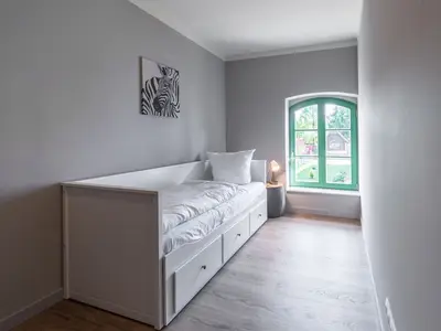 Ferienwohnung Heimathafen Klink extra Schlafzimmer mit einem Einzelbett