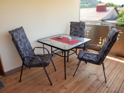 Überdachter Balkon