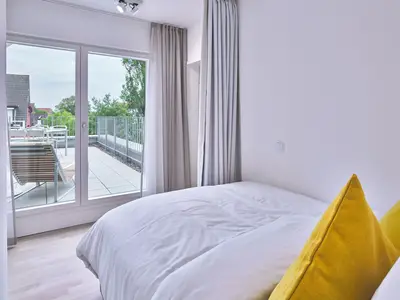 Schlafzimmer mit Doppelbett