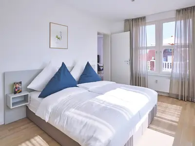 Schlafzimmer mit Doppelbett