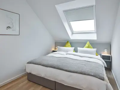 Schlafzimmer mit Doppelbett