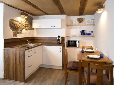 Küche und gemütlicher Essbereich