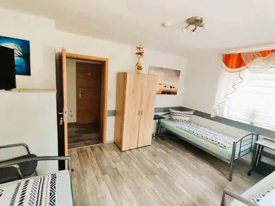 Helles komfortables Schlafzimmer „Rosmarin“