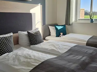 Schlafraum Doppelbett und Einzelbett