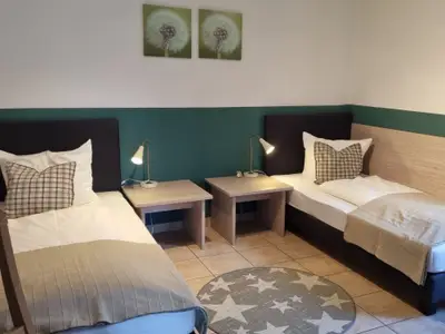 Schlafzimmer mit Einzelbetten