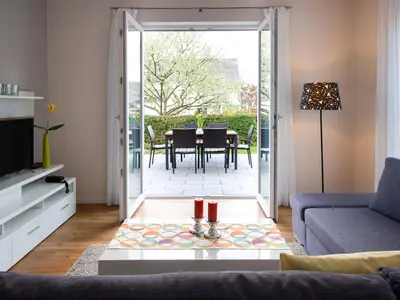 Wohnzimmer und Terrasse Ferienwohnung "Valentina"