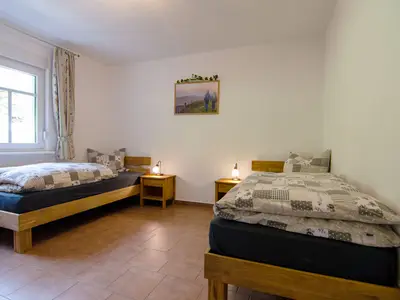 Schlafzimmer 1 Ferienwohnung Kornkammer