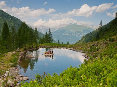 Bodsfahrt auf einen Teich in Lesachtal