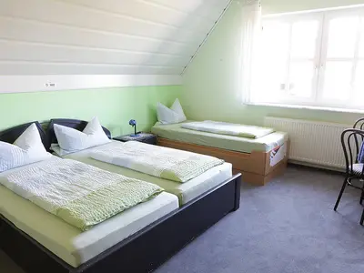 Schlafzimmer in der Ferienwohnung Kornblume