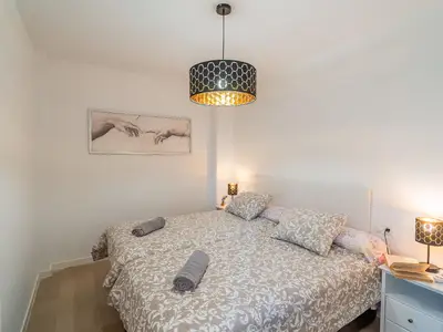 Drittes Schlafzimmer mit Doppelbett