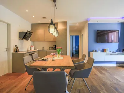 Ferienwohnung Inselsuite Malchow Essbereich mit offener Küche