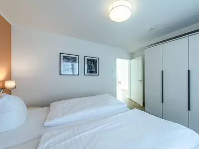 Ferienwohnung Wasserlilie Malchow Schlafzimmer mit Doppelbett