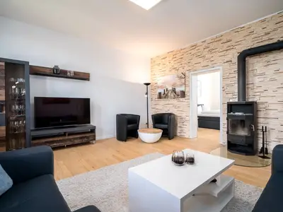 Ferienwohnung BlueSea in Malchow Kamin im Wohnbereich