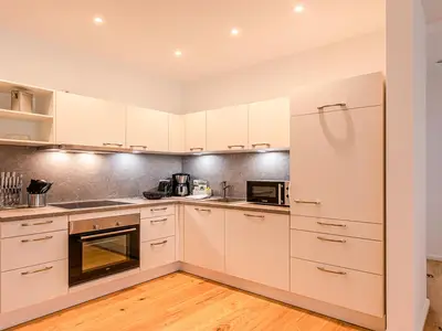 Ferienwohnung Inselpirat Malchow Blick in die offene Küche
